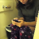 A hidden camera records a pretty girl as she takes a break from the party downstairs to poop while sitting on a toilet and check her emails. Nice, audible plopping sounds can be heard. See movie 7166 for more. Over 8 minutes.